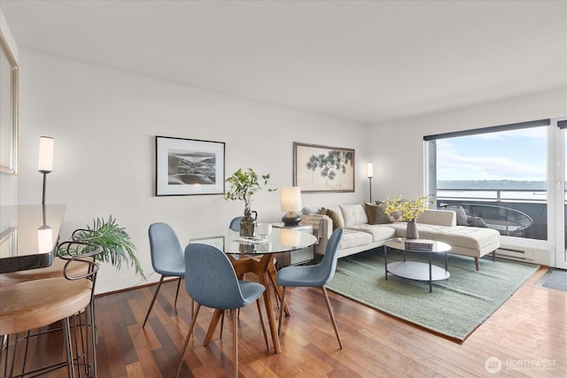 1415 2nd Ave NE Unit 1801, Seattle, WA 98101 - dining area with wood finished floors and baseboards
