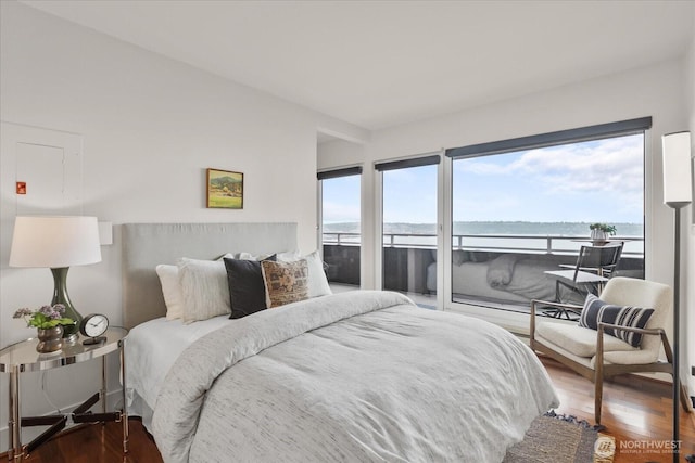 1415 2nd Ave NE Unit 1801, Seattle, WA 98101 - bedroom with access to outside, multiple windows, and a water view