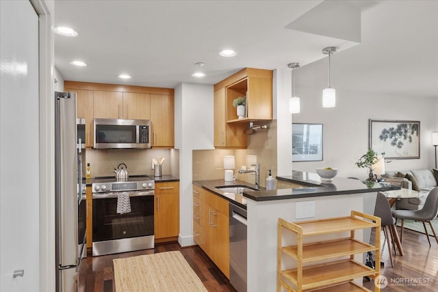 1415 2nd Ave NE Unit 1801, Seattle, WA 98101 - kitchen featuring stainless steel appliances, dark countertops, dark wood-style floors, open shelves, and a peninsula