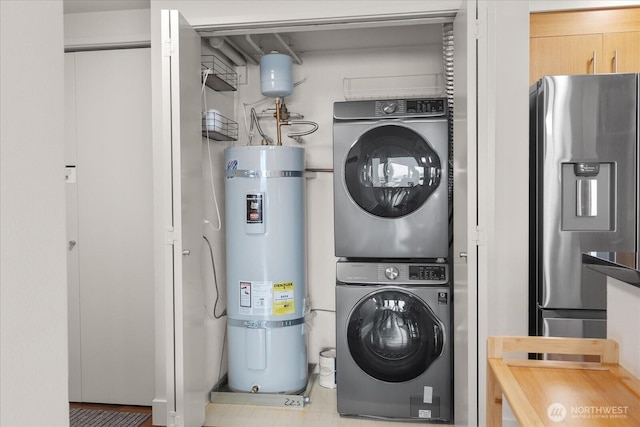 1415 2nd Ave NE Unit 1801, Seattle, WA 98101 - laundry area with strapped water heater and stacked washing machine and dryer