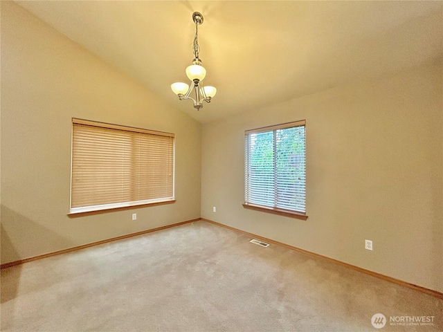 4544 Durham St SE, Lacey, WA 98503 - spare room with a chandelier, carpet flooring, and vaulted ceiling
