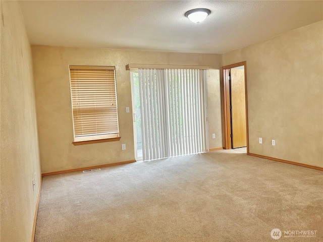 4544 Durham St SE, Lacey, WA 98503 - carpeted empty room with baseboards