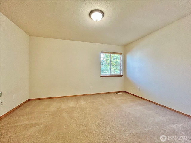 4544 Durham St SE, Lacey, WA 98503 - empty room featuring light carpet and baseboards