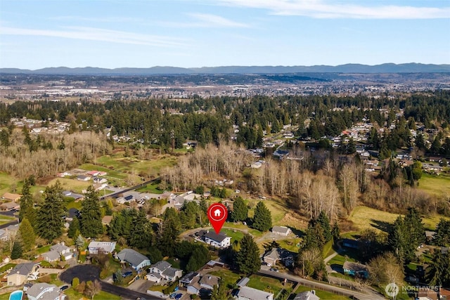 7707 42nd Ave E, Tacoma, WA 98443 - aerial view of property and surrounding area featuring mountains