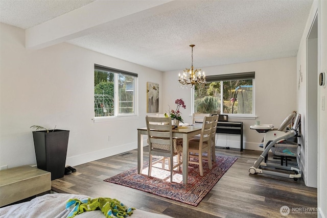 7707 42nd Ave E, Tacoma, WA 98443 - dining room with a chandelier, a textured ceiling, and dark wood finished floors