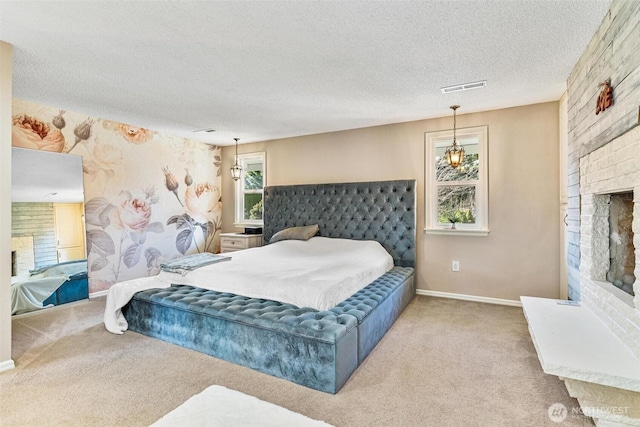 7707 42nd Ave E, Tacoma, WA 98443 - carpeted bedroom featuring a fireplace, a textured ceiling, and wallpapered walls