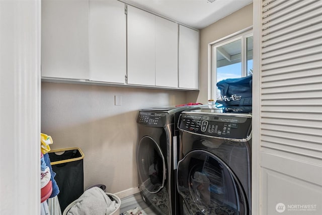 7707 42nd Ave E, Tacoma, WA 98443 - laundry room featuring washer and dryer and cabinet space