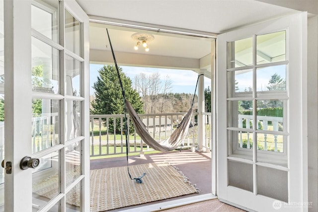 7707 42nd Ave E, Tacoma, WA 98443 - doorway featuring plenty of natural light and carpet floors