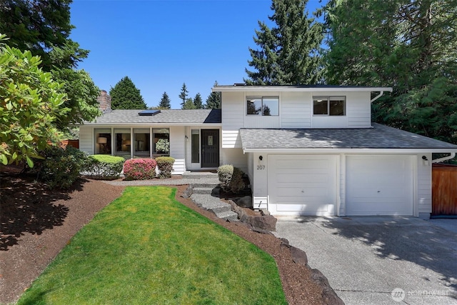 207 215th St SE, Bothell, WA 98021 - split level home featuring a garage, a shingled roof, driveway, a front lawn, and a chimney