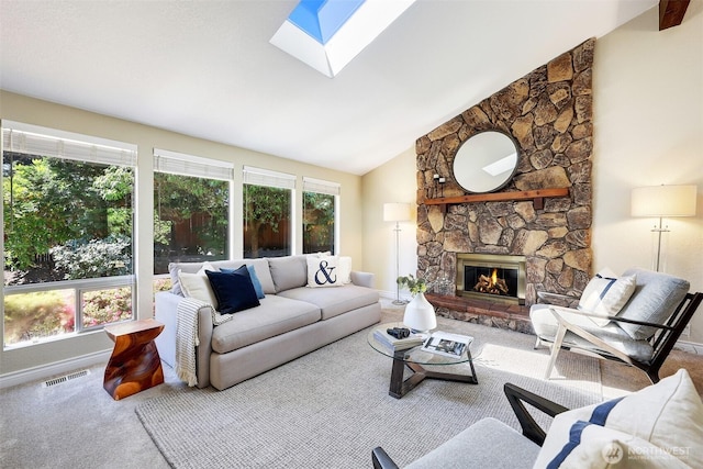 207 215th St SE, Bothell, WA 98021 - living room with carpet, a skylight, a fireplace, and vaulted ceiling