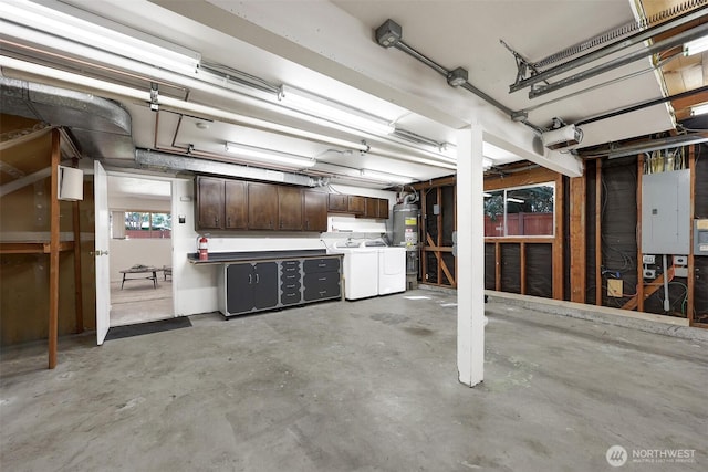 207 215th St SE, Bothell, WA 98021 - garage with washer and clothes dryer, electric panel, water heater, and a garage door opener