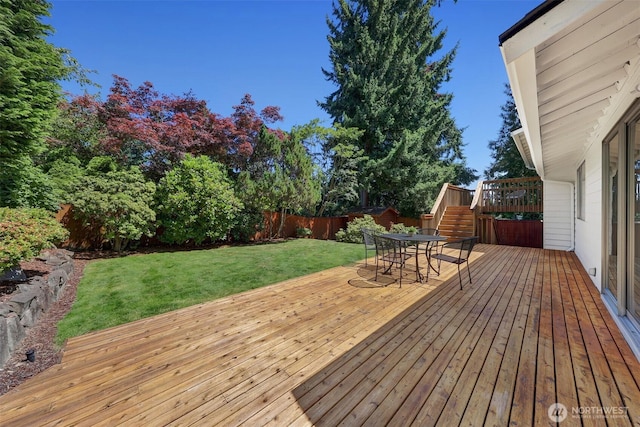 207 215th St SE, Bothell, WA 98021 - deck featuring a fenced backyard and outdoor dining area