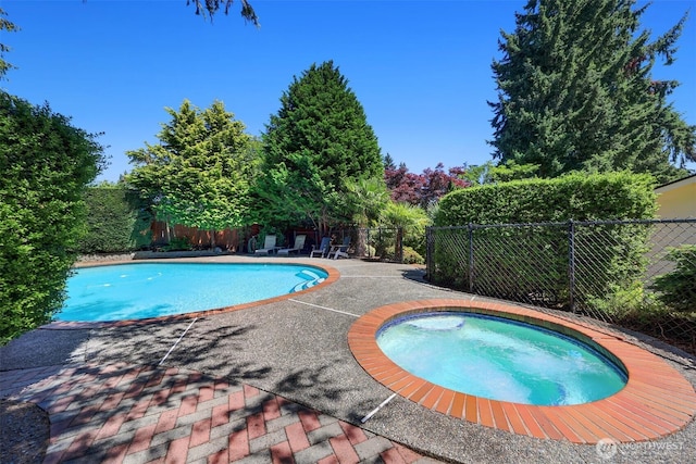 207 215th St SE, Bothell, WA 98021 - view of pool with a fenced backyard, an in-ground hot tub, and a patio