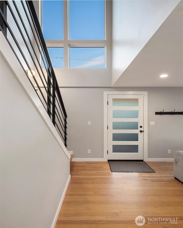 7503 32nd Ave NE, Seattle, WA 98115 - foyer entrance featuring stairs, light wood-type flooring, and recessed lighting