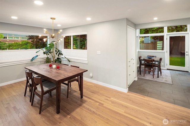 7503 32nd Ave NE, Seattle, WA 98115 - dining space featuring a chandelier, light wood-style flooring, and recessed lighting