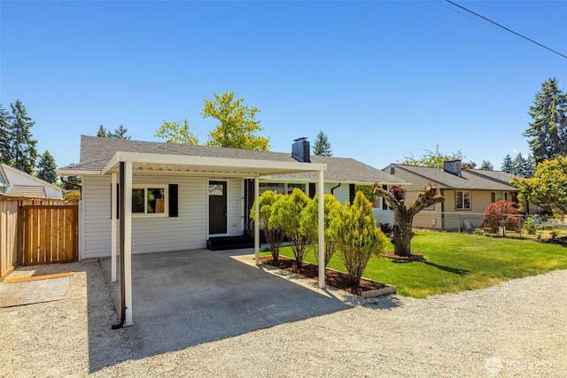 1316 115th St S, Tacoma, WA 98444 - view of front of property with an attached carport, a chimney, and roof with shingles
