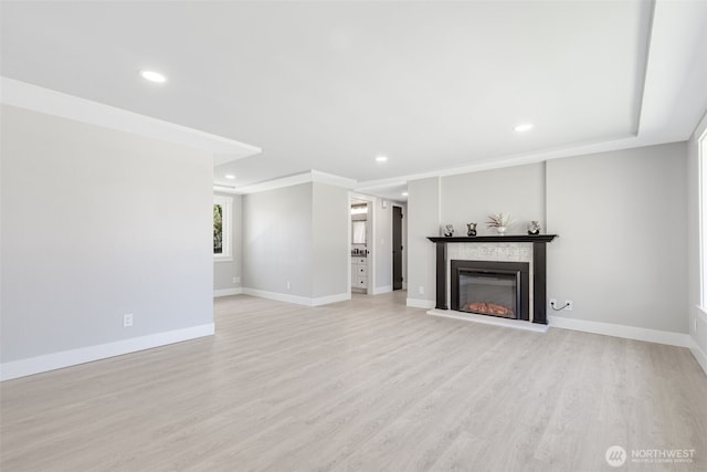 1316 115th St S, Tacoma, WA 98444 - unfurnished living room featuring recessed lighting, a glass covered fireplace, and light wood-style floors