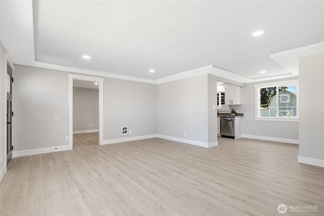 1316 115th St S, Tacoma, WA 98444 - unfurnished living room featuring light wood finished floors and recessed lighting