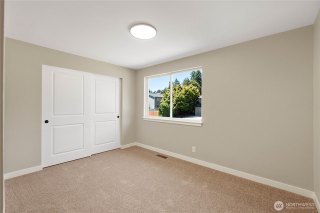31228 47th Pl SW, Federal Way, WA 98023 - unfurnished bedroom featuring carpet flooring and baseboards