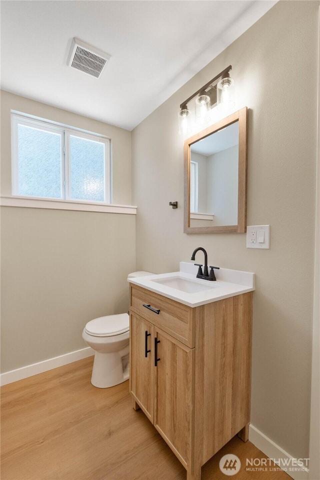 31228 47th Pl SW, Federal Way, WA 98023 - half bathroom featuring vanity and wood finished floors