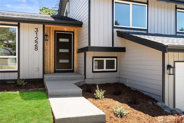31228 47th Pl SW, Federal Way, WA 98023 - doorway to property featuring a shingled roof and board and batten siding