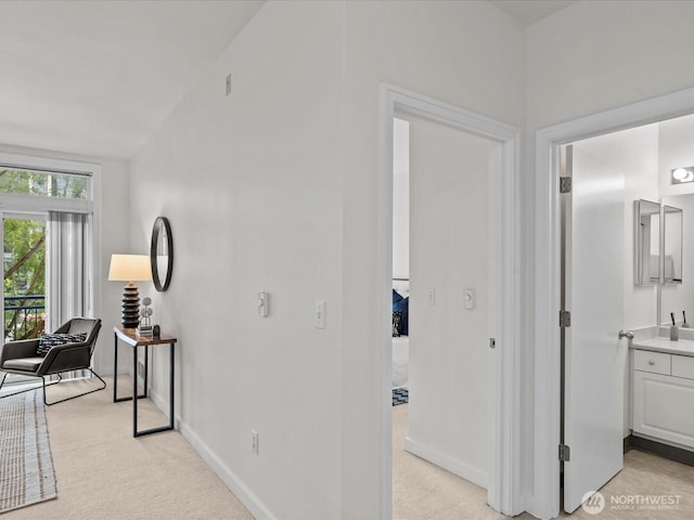 2415 2nd Ave Unit 541, Seattle, WA 98121 - corridor featuring light colored carpet and vaulted ceiling