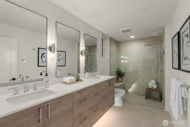 112C 2nd St S, Kirkland, WA 98033 - bathroom featuring tile patterned flooring, double vanity, and a shower stall