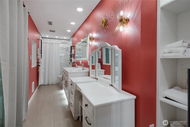 6808 243rd Ave E, Buckley, WA 98321 - full bath with vanity, a shower with curtain, and recessed lighting