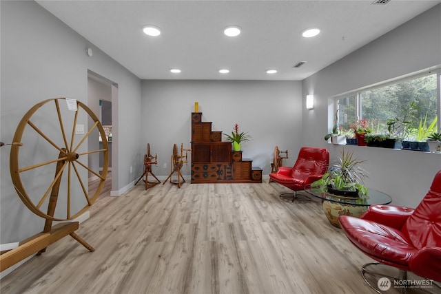 6808 243rd Ave E, Buckley, WA 98321 - sitting room with wood finished floors and recessed lighting