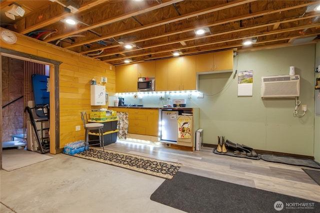 6808 243rd Ave E, Buckley, WA 98321 - kitchen with stainless steel microwave, a wall mounted AC, and concrete flooring