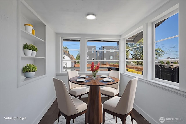 1433 E 32nd St, Tacoma, WA 98404 - dining area featuring baseboards and wood finished floors