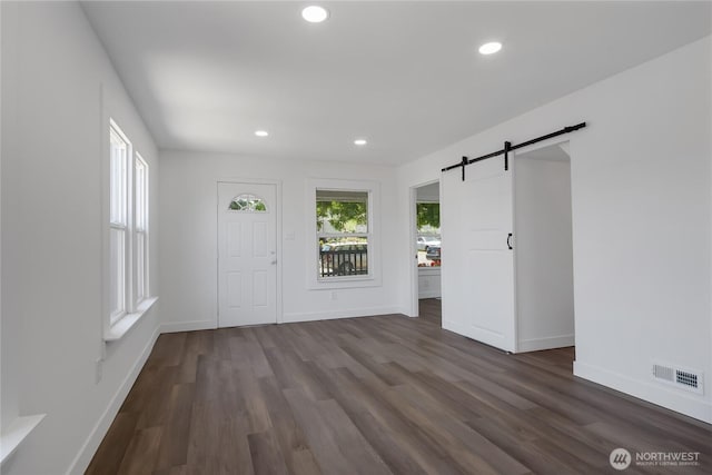 1433 E 32nd St, Tacoma, WA 98404 - entrance foyer featuring a barn door, dark wood-type flooring, and recessed lighting