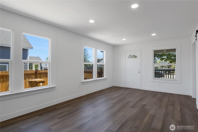 1433 E 32nd St, Tacoma, WA 98404 - entrance foyer with healthy amount of natural light, dark wood-style flooring, recessed lighting, and a barn door