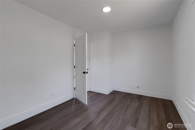 1433 E 32nd St, Tacoma, WA 98404 - empty room with dark wood-style floors and recessed lighting