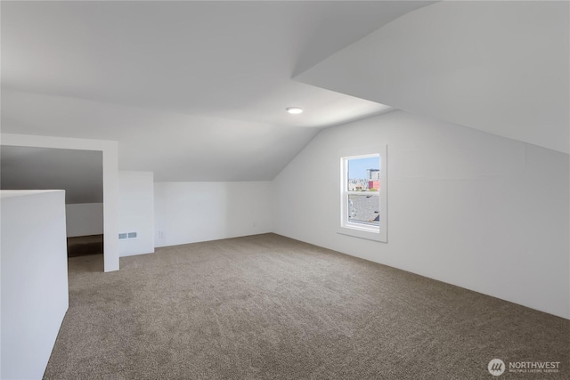 1433 E 32nd St, Tacoma, WA 98404 - bonus room featuring carpet floors and lofted ceiling