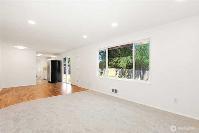 16548 115th Ave SE, Renton, WA 98055 - empty room with light colored carpet and recessed lighting