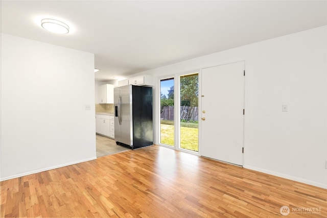16548 115th Ave SE, Renton, WA 98055 - spare room featuring light wood-style flooring