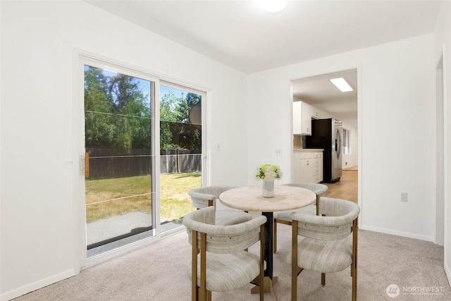 16548 115th Ave SE, Renton, WA 98055 - dining area with light carpet and baseboards