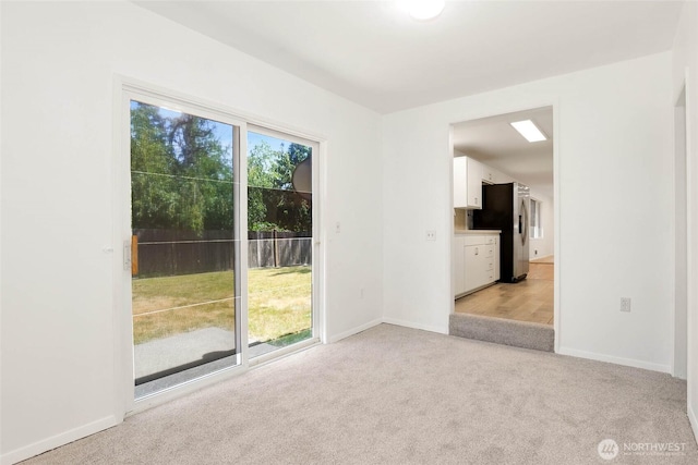 16548 115th Ave SE, Renton, WA 98055 - empty room featuring light colored carpet and baseboards