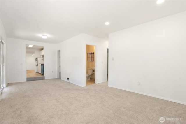 16548 115th Ave SE, Renton, WA 98055 - spare room with light colored carpet and recessed lighting