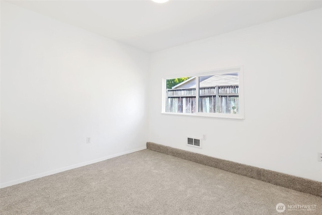 16548 115th Ave SE, Renton, WA 98055 - spare room with carpet and baseboards