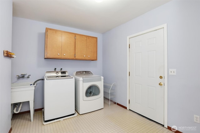 16548 115th Ave SE, Renton, WA 98055 - washroom featuring cabinet space and independent washer and dryer