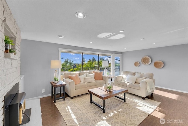 619 8th Ave S, Edmonds, WA 98020 - living area with light wood-type flooring, a fireplace, and recessed lighting