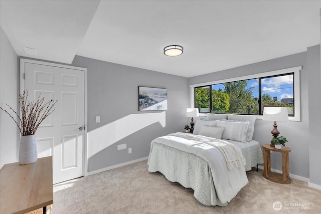 619 8th Ave S, Edmonds, WA 98020 - bedroom featuring baseboards and light colored carpet
