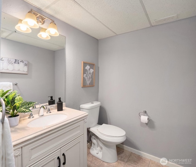 619 8th Ave S, Edmonds, WA 98020 - bathroom with vanity, tile patterned floors, and a drop ceiling
