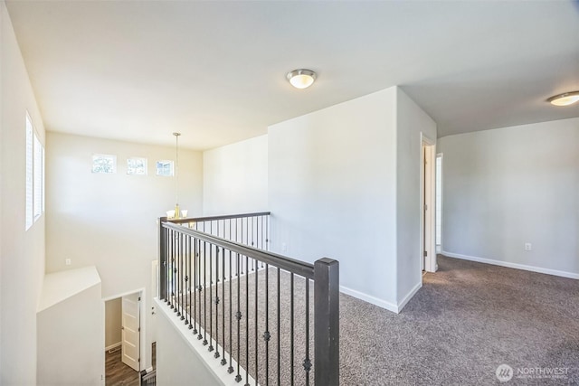 4749 NE Waxwing Ct, Lacey, WA 98516 - corridor with an upstairs landing, a chandelier, and carpet
