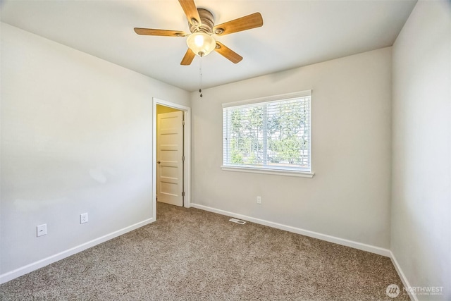 4749 NE Waxwing Ct, Lacey, WA 98516 - carpeted empty room featuring baseboards and a ceiling fan