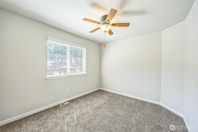 4749 NE Waxwing Ct, Lacey, WA 98516 - carpeted empty room with a ceiling fan and baseboards