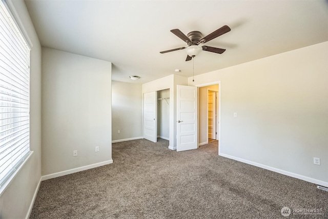 4749 NE Waxwing Ct, Lacey, WA 98516 - unfurnished bedroom with carpet flooring, a closet, and ceiling fan