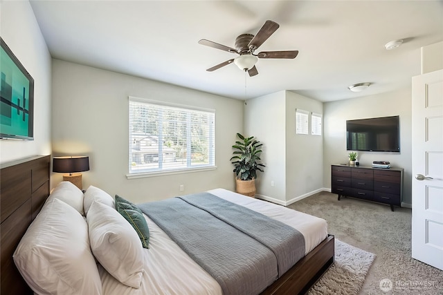 4749 NE Waxwing Ct, Lacey, WA 98516 - carpeted bedroom featuring ceiling fan and baseboards